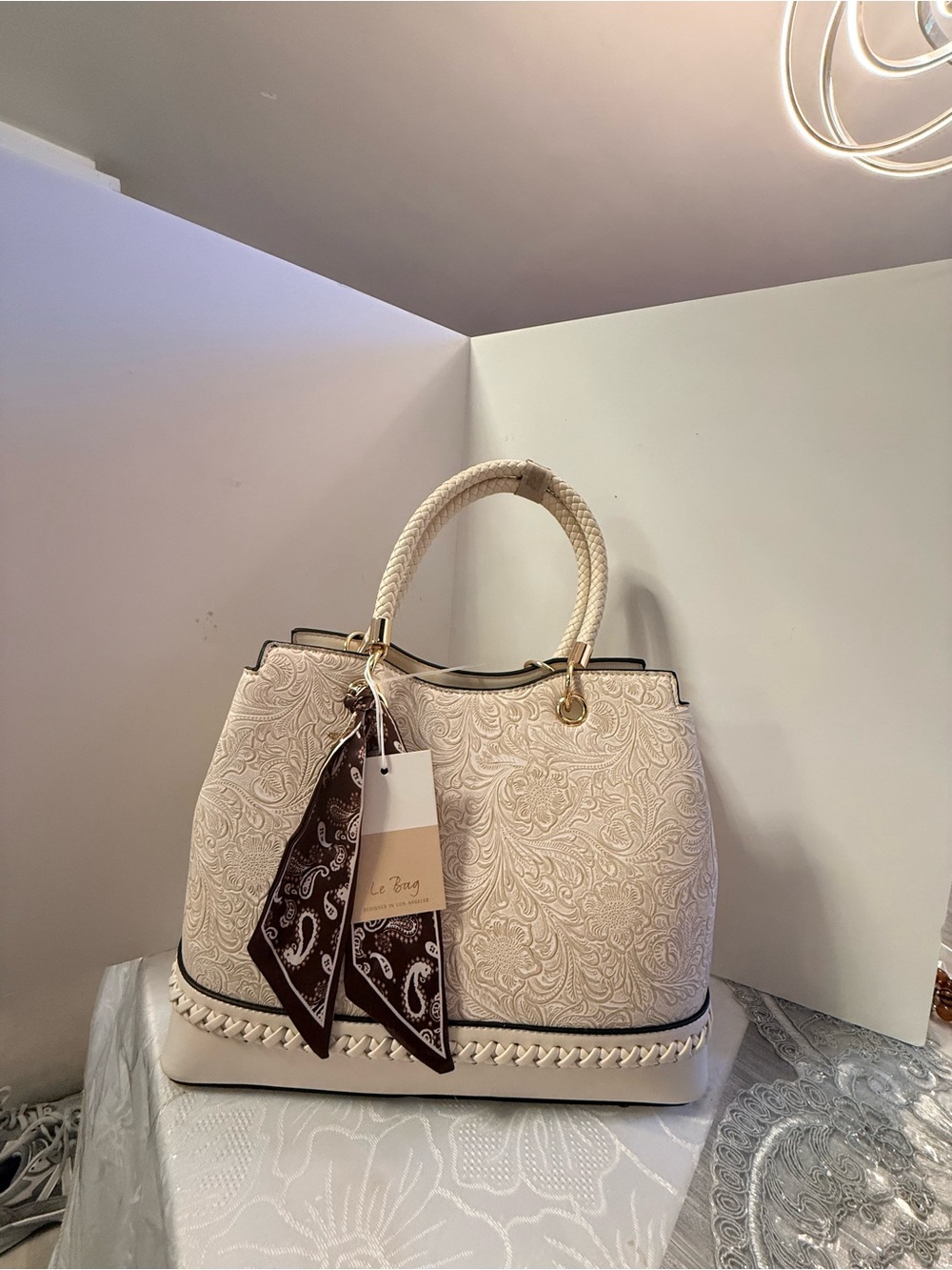 Ivory Embossed Satchel with Braided Handles and Scarf Accent